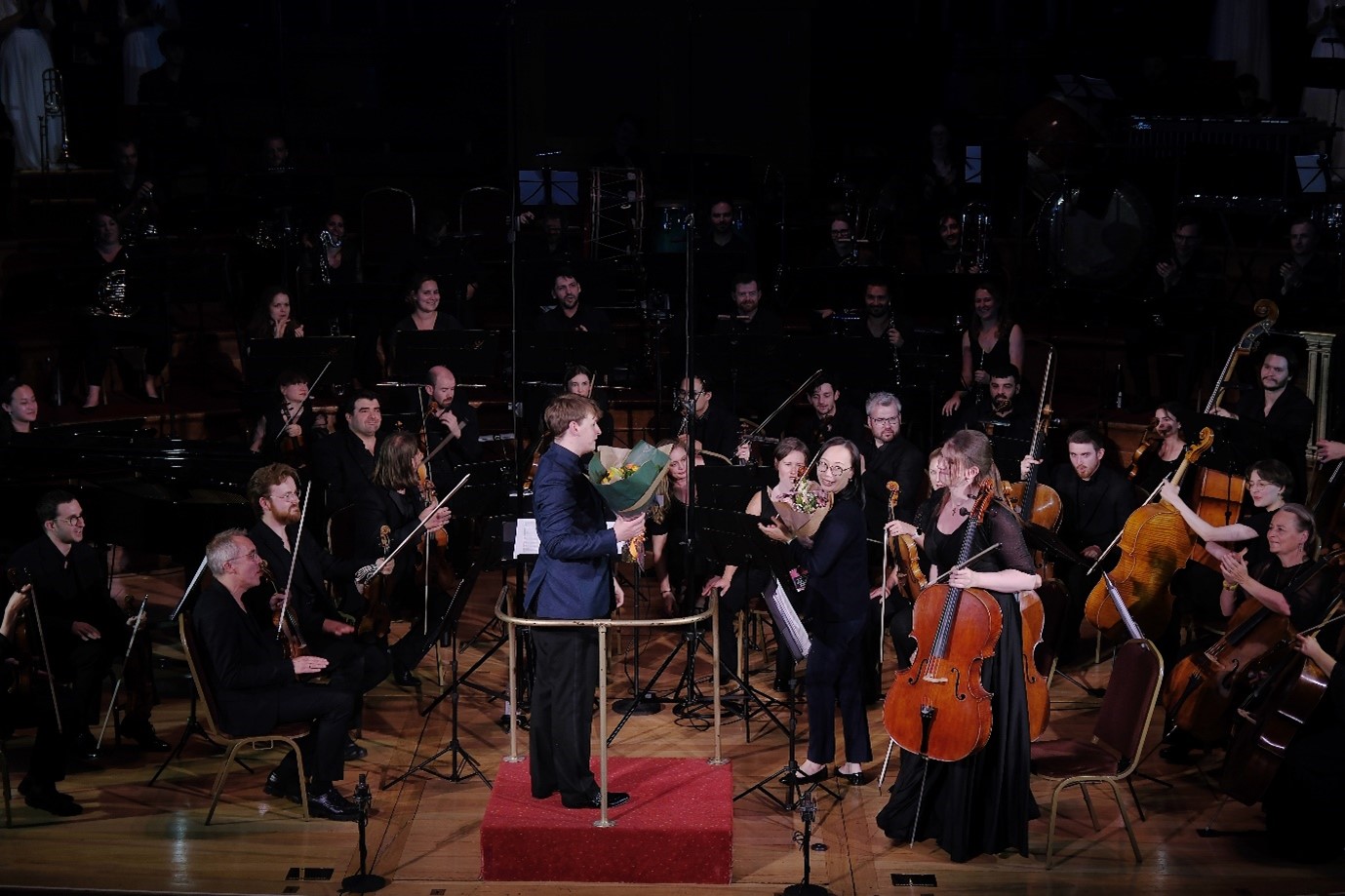 Conductor Derrick Morgan after the performance. Image provided to China Minutes.