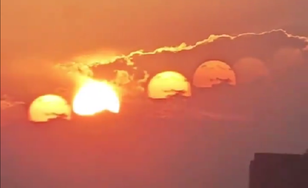 A screenshot of the video showing seven suns in the sky over Chengdu, China.