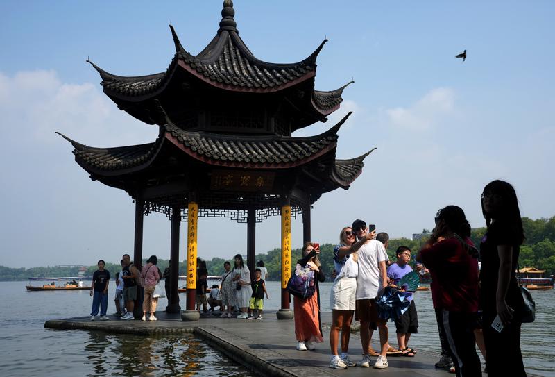 This is West Lake, which is famous for the ancient Chinese mythological story "The Legend of the White Snake".