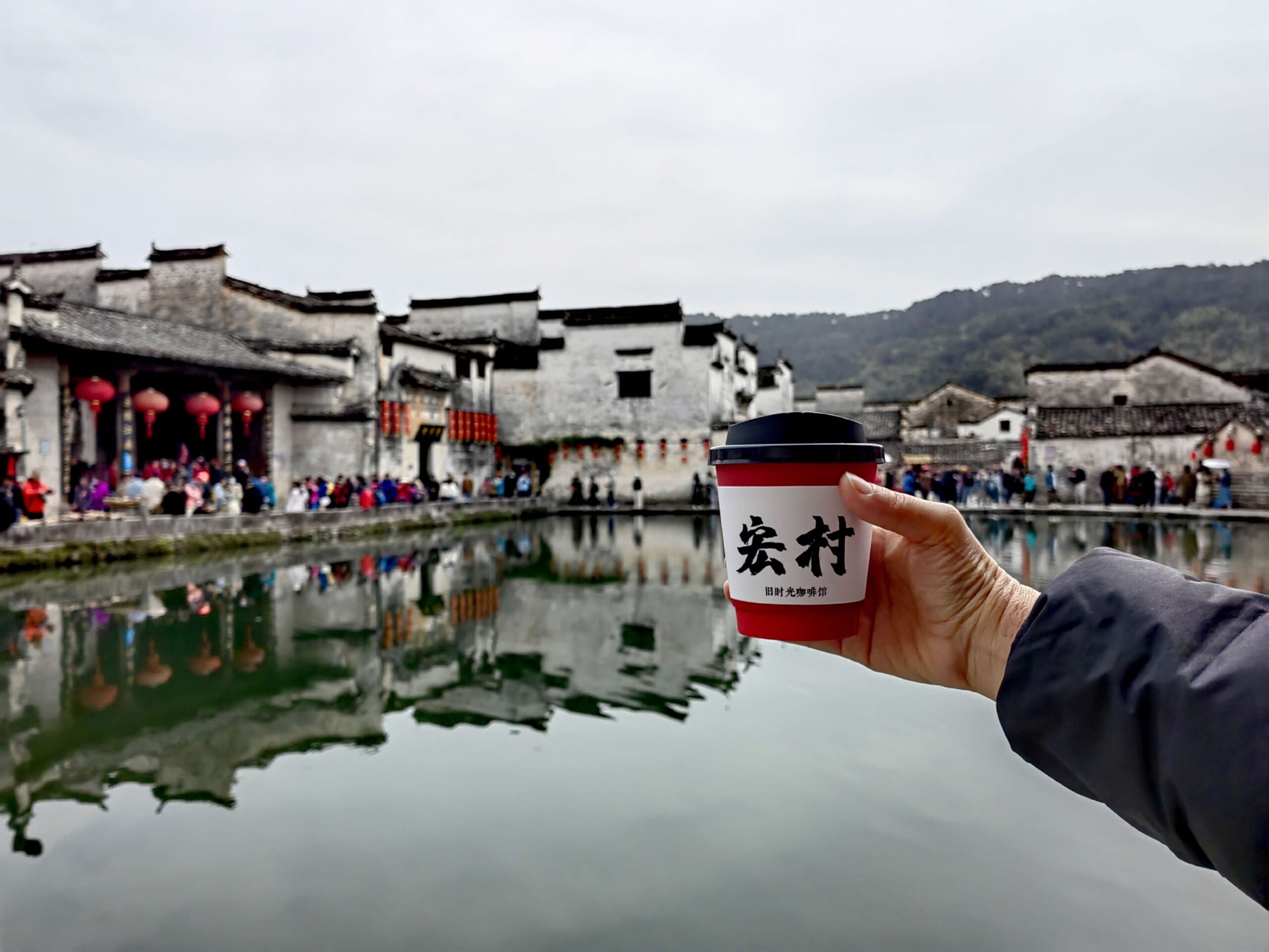 Tourists checked in at a local café in Hongcun, Yi County, Anhui Province.