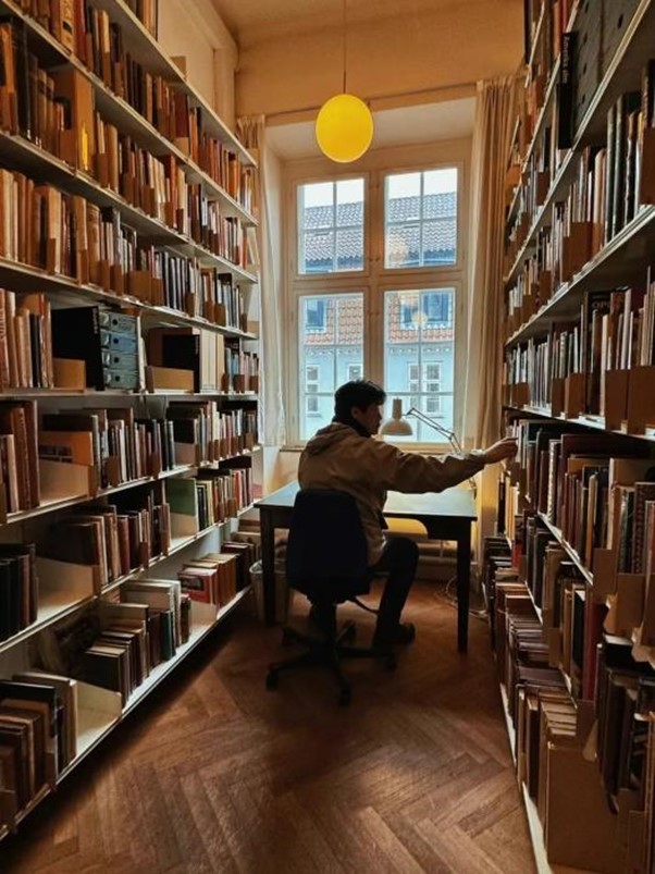 Nie Jun working on the book ‘Shiny and Lei Gong’ in Denmark in 2024. Credit, the interviewee.