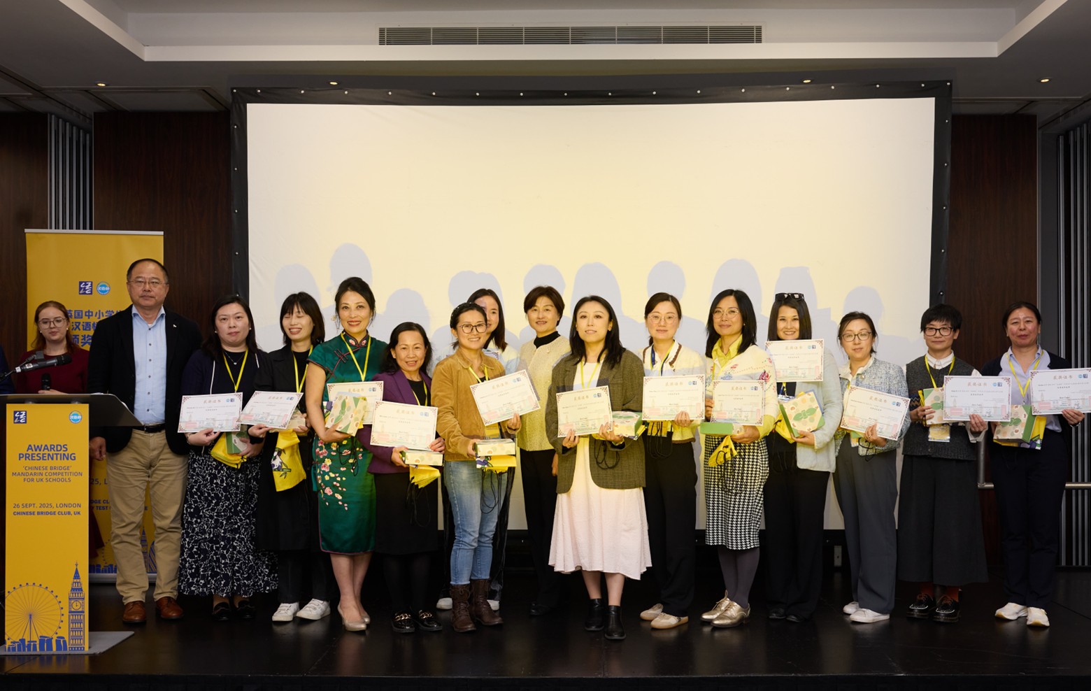 Winners of the “Outstanding Teacher” award in the secondary school category receive their prizes at the ceremony. Photo courtesy of the organizers