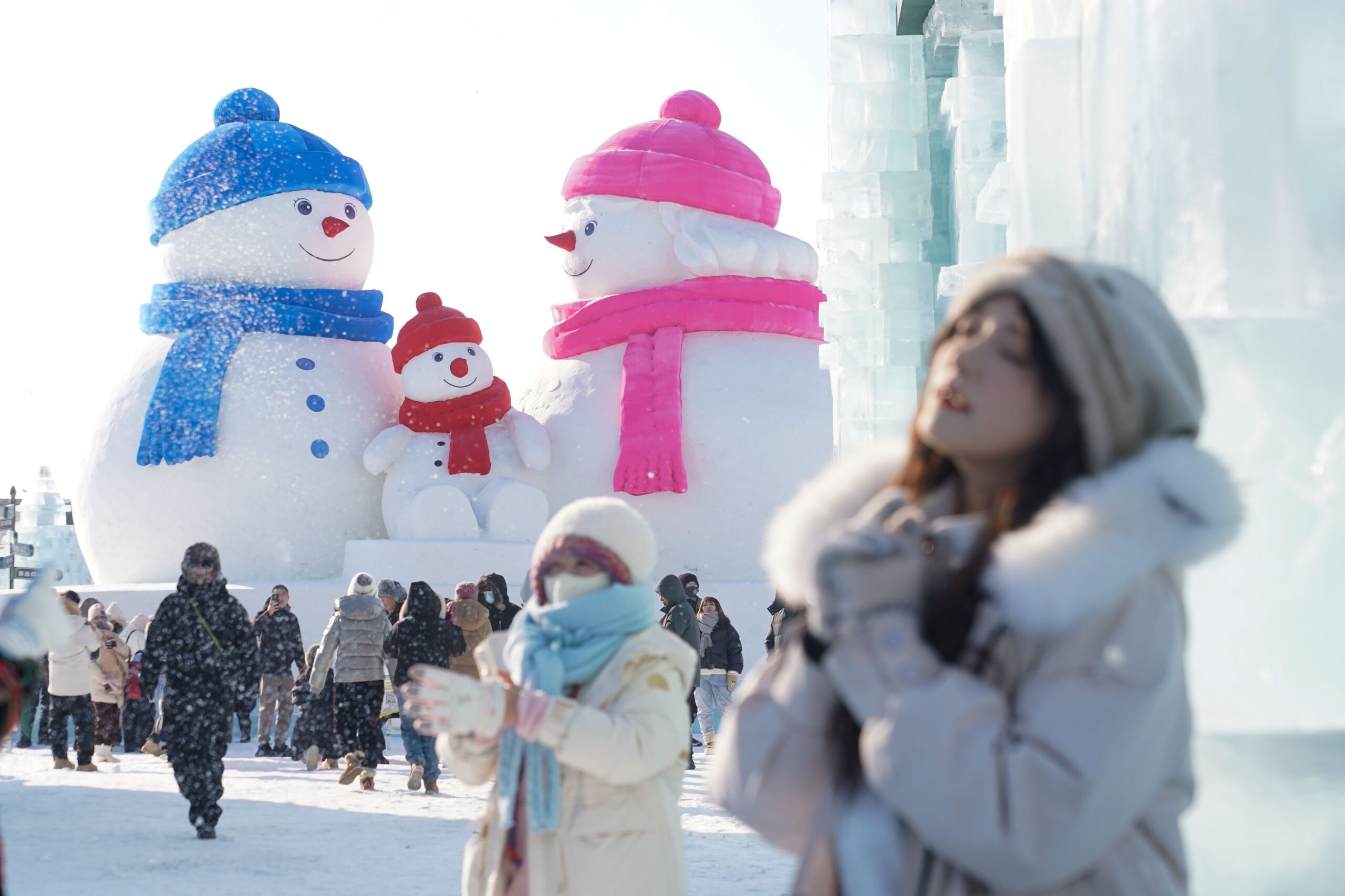 Visitors stop to take photos at Harbin Ice and Snow World