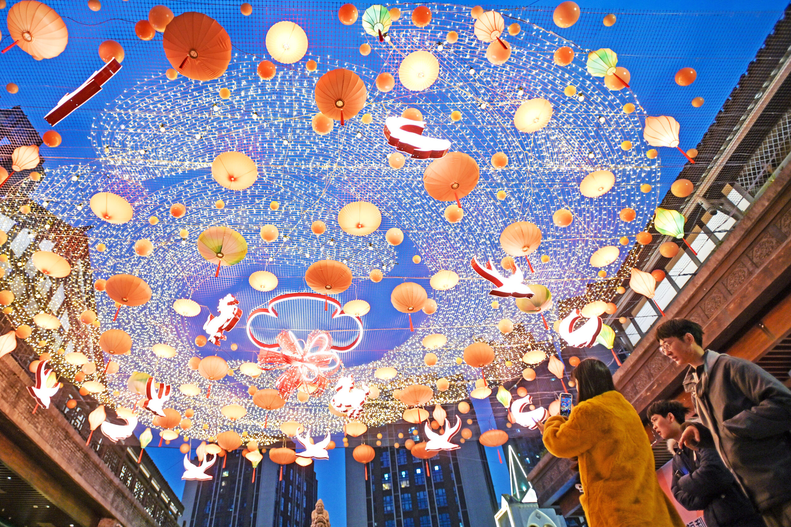 Visitors admire a New Year lantern show at Chongqing