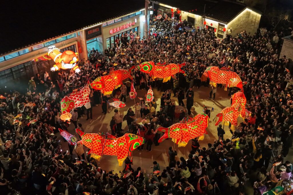 The fish-lantern troupe parades 