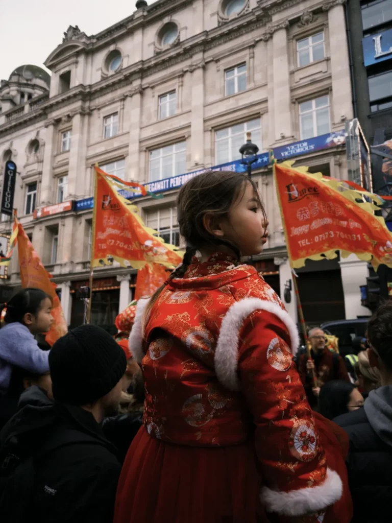 The crowd watching the Chinese New Year Parade. Images by Chenny. 