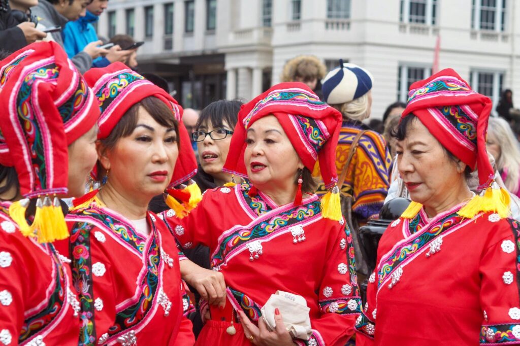 Performers wearing traditional costumes at Chinese New Year celebration in London.